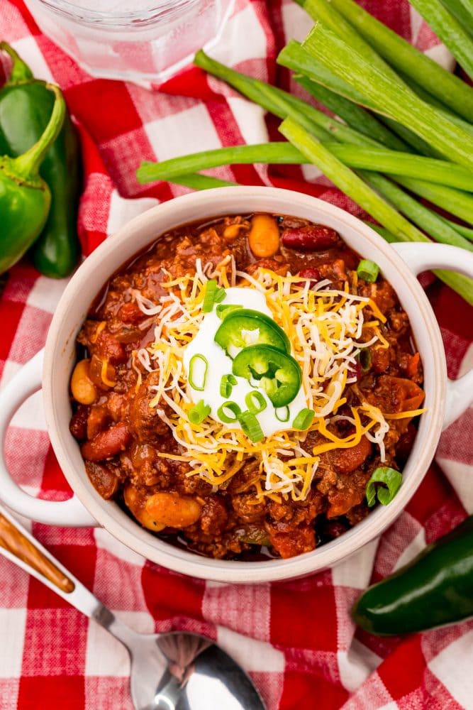 picture of slow cooker chili in a white bowl 