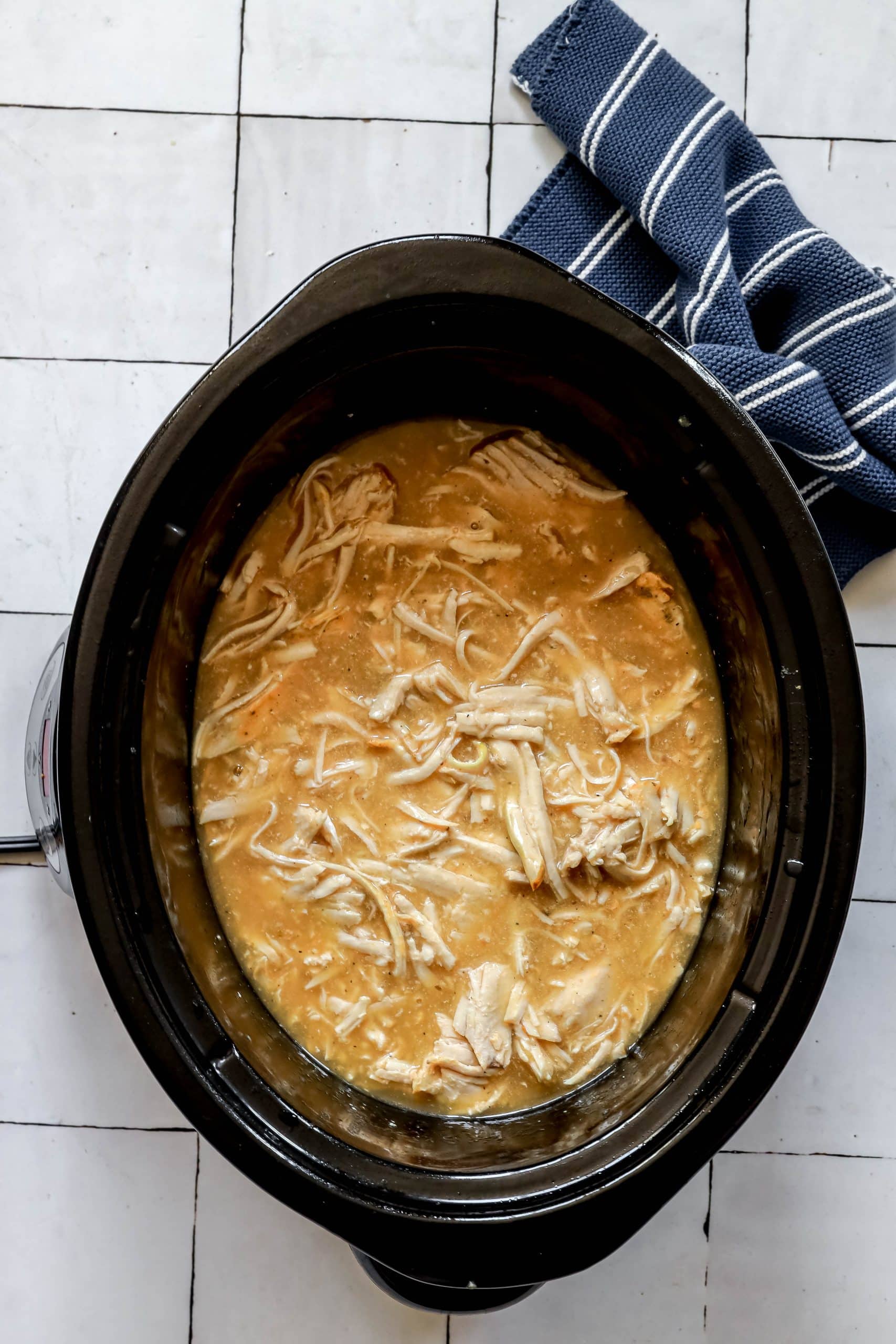 picture of shredded turkey and gravy in slow cooker