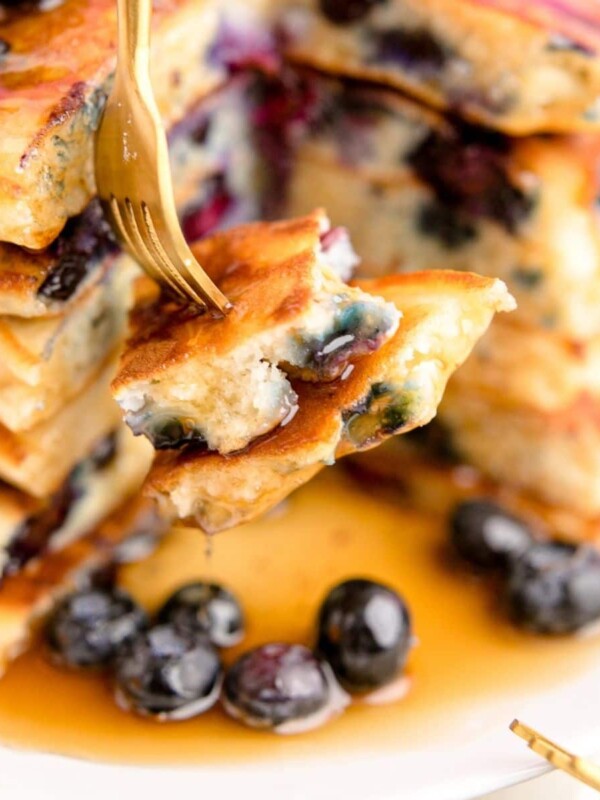stack of blueberry pancakes with syrup