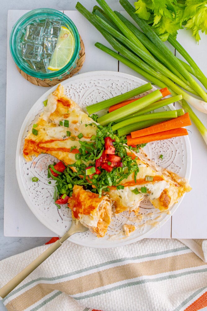 picture of buffalo ranch chicken enchiladas on a plate