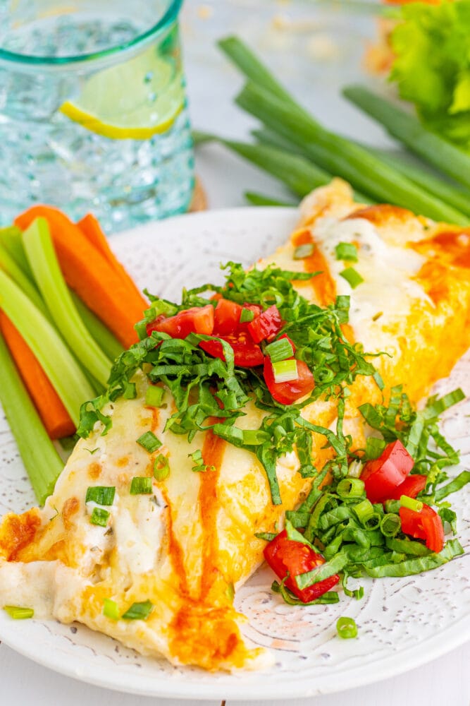 picture of buffalo ranch chicken enchiladas on a plate