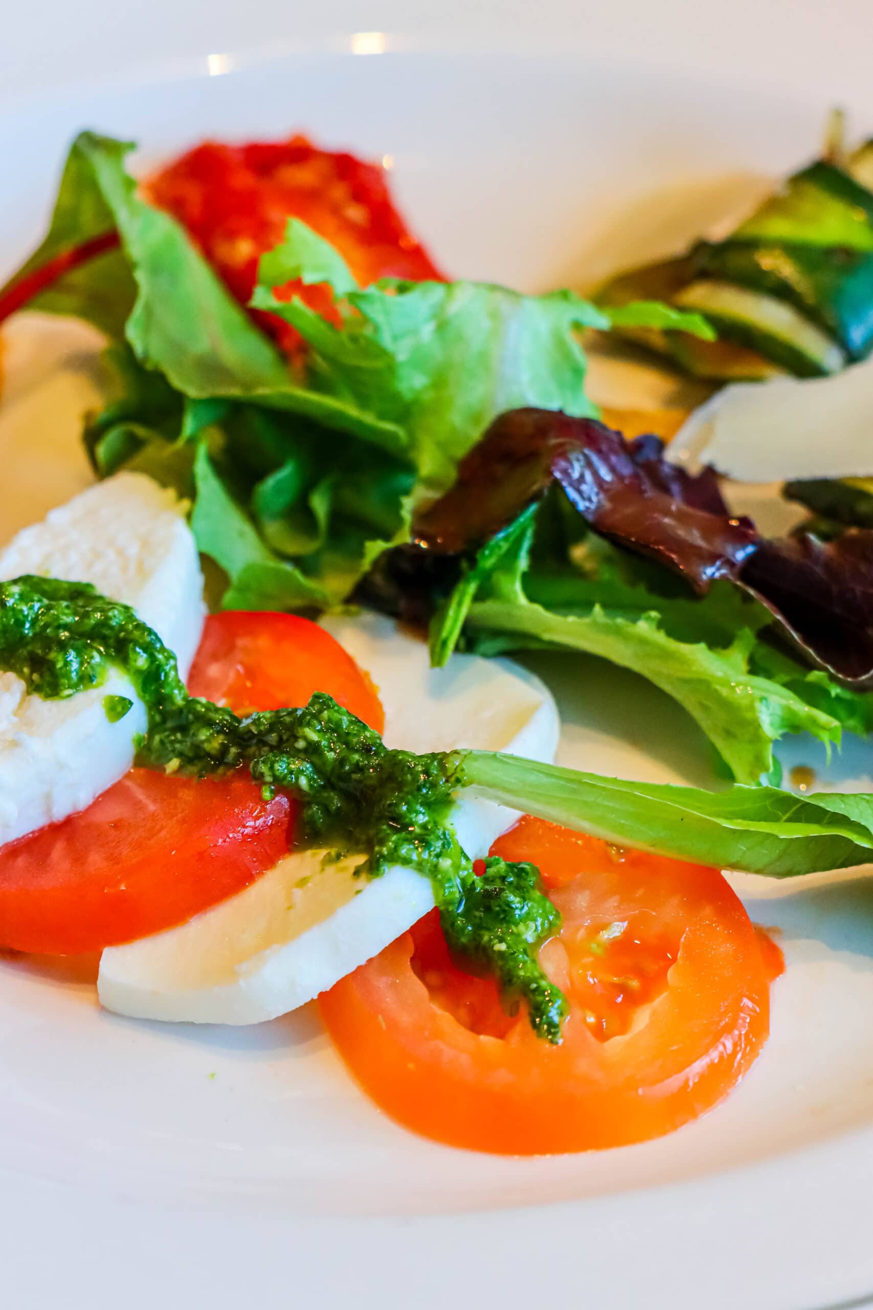 Your Ultimate Dining Guide for the Majestic Princess 29 A fresh and vibrant caprese salad, featuring ripe tomatoes, mozzarella, and basil, a perfect Italian appetizer.