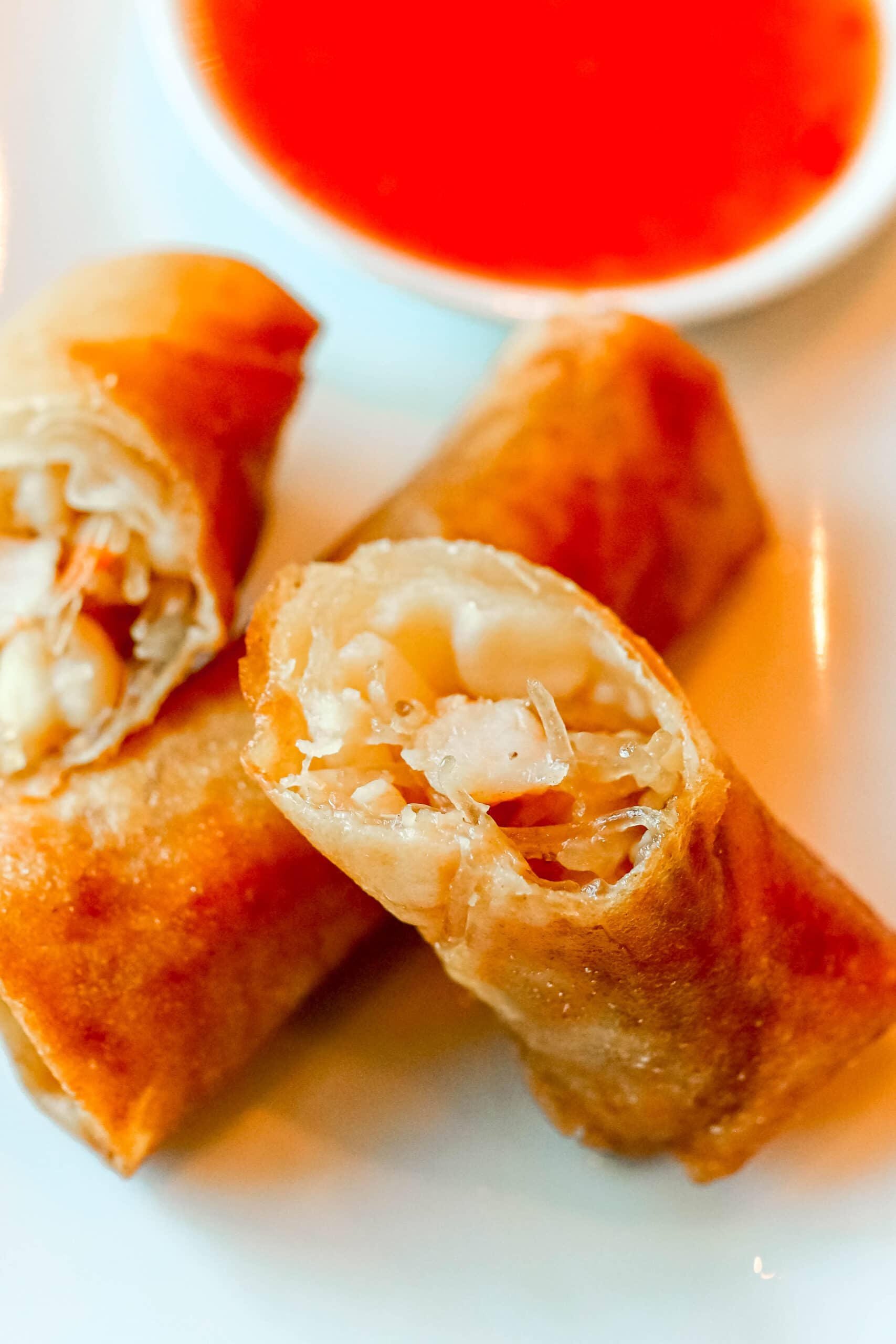 Your Ultimate Dining Guide for the Majestic Princess 12 Crispy Thai spring rolls served with a delectable dipping sauce, a perfect appetizer on Majestic Princess.