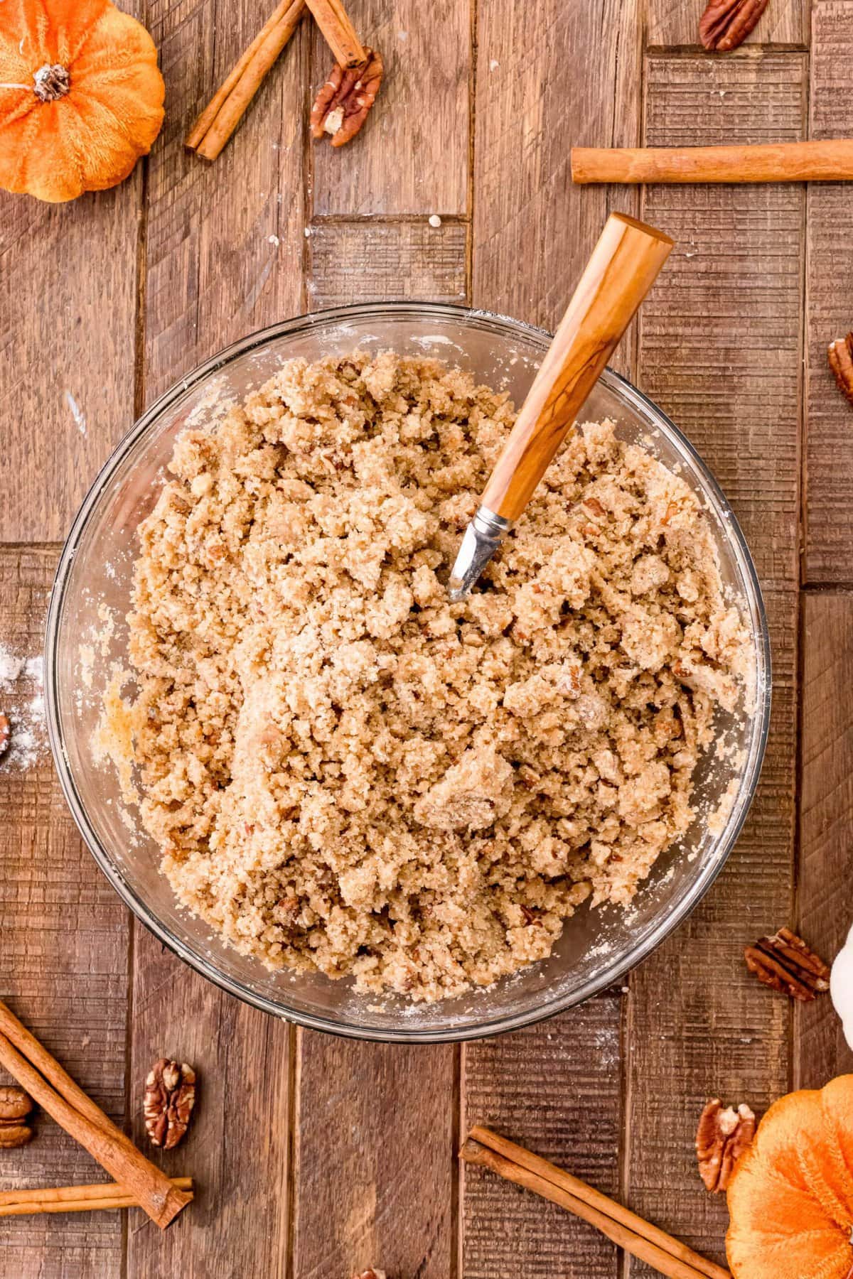 picture of dry crumble topping being mixed in a bowl
