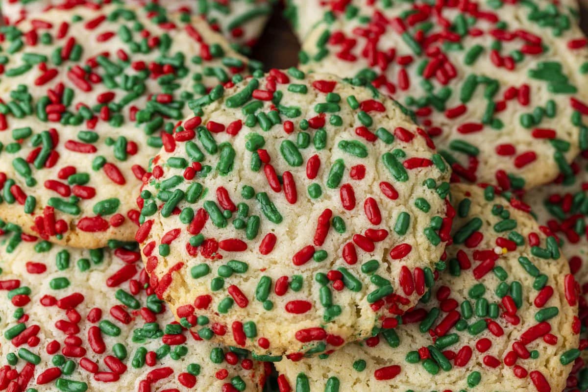 Sprinkle cookies with red, green and white sprinkles.