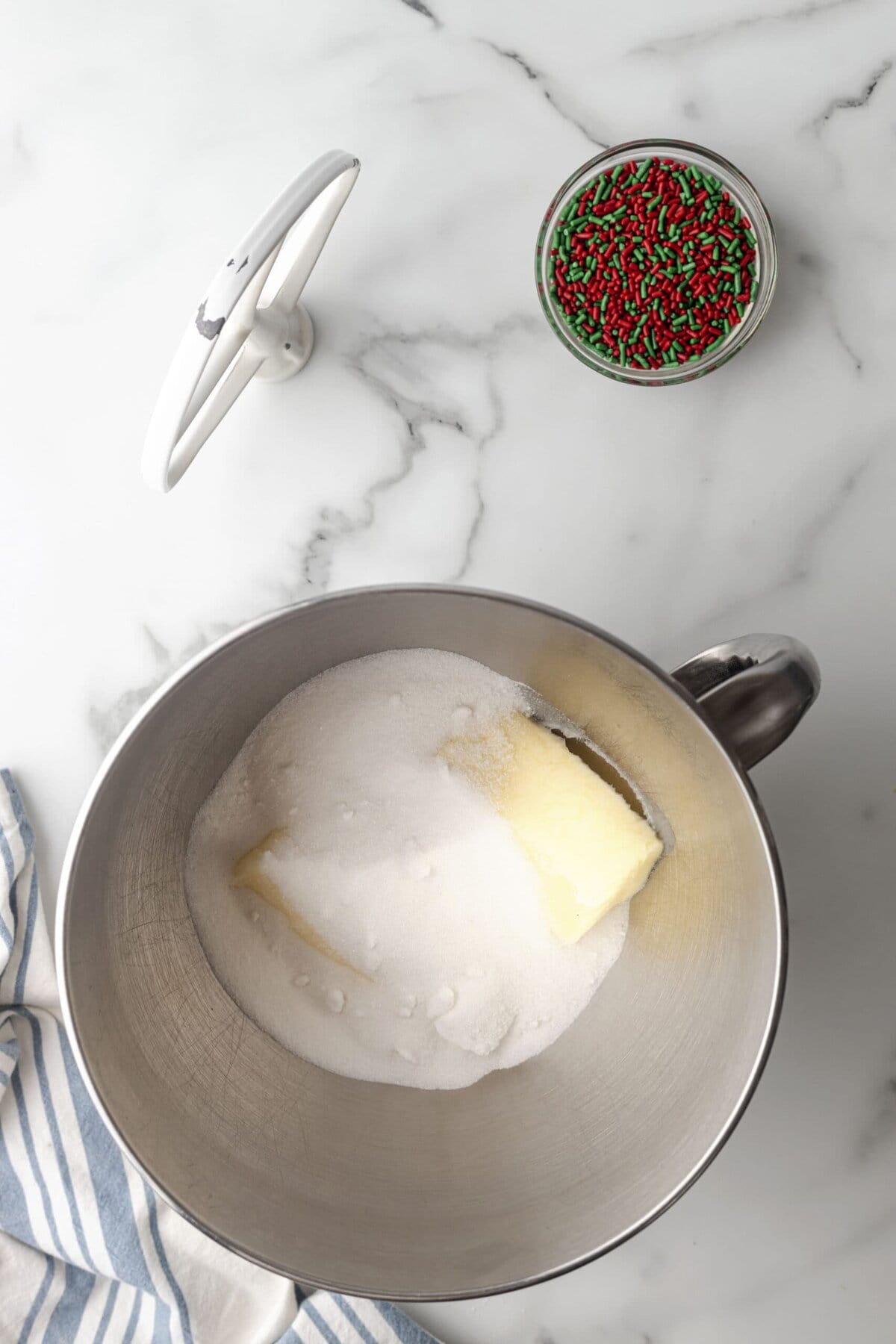 picture of butter and sugar in a bowl of a stand mixer