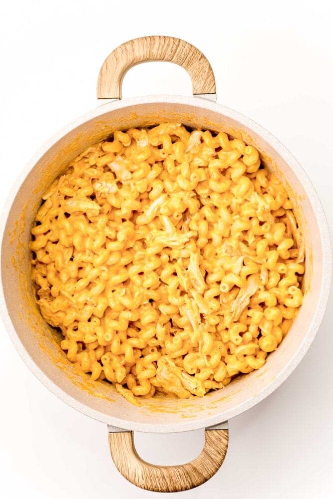 Fiery Buffalo Mac 'n' Cheese 8 Buffalo chicken macaroni and cheese in a pot on a white background.