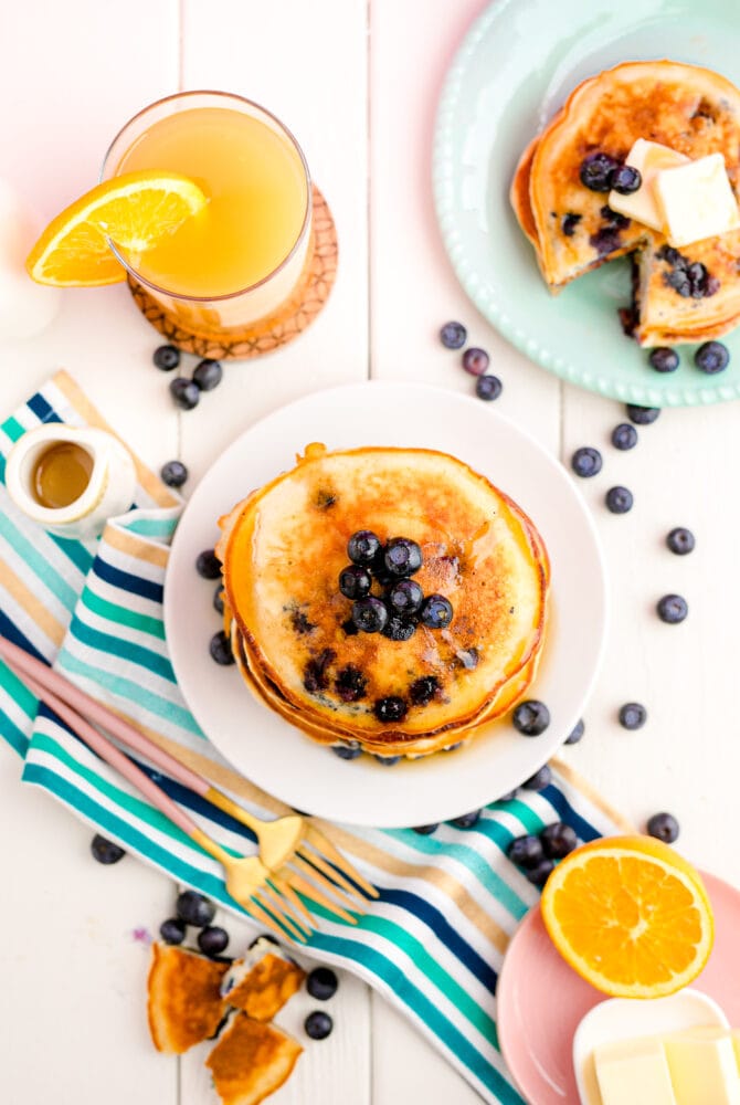 stack of blueberry pancakes with syrup 