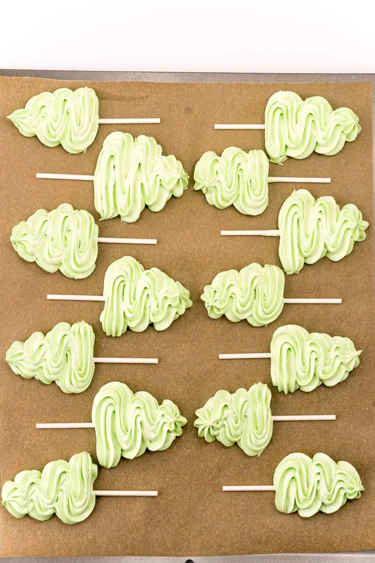 picture of meringue christmas tree piped onto parchment paper