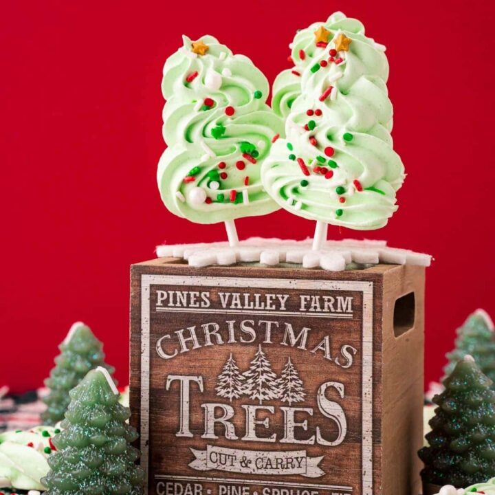 picture of meringue christmas trees on a wooden box