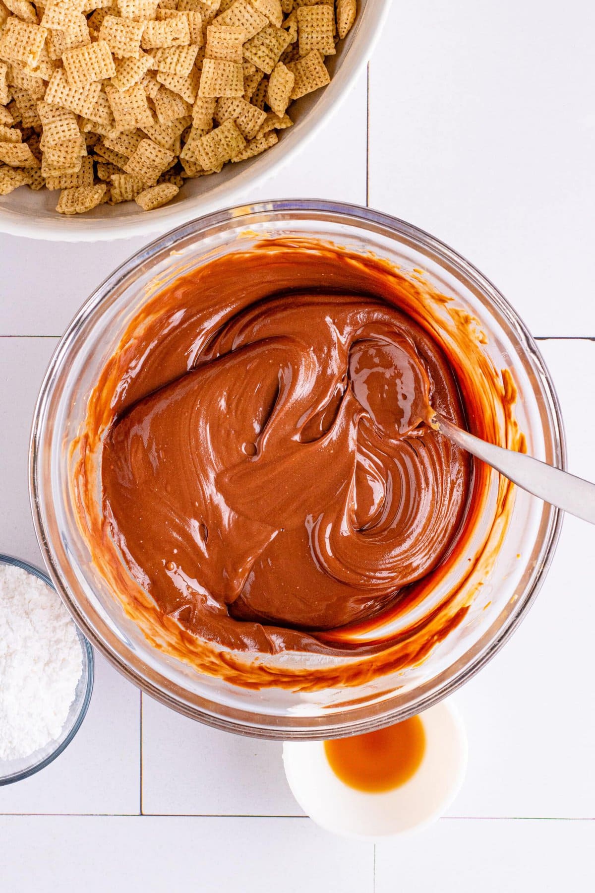picture of melted peanut butter, butter, chocolate chips in a bowl