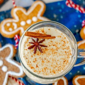 picture of eggnog in a glass mug with nutmeg on top