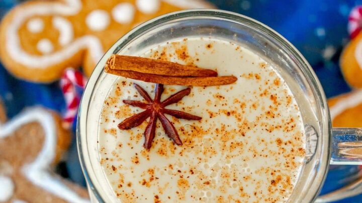 picture of eggnog in a glass mug with nutmeg on top