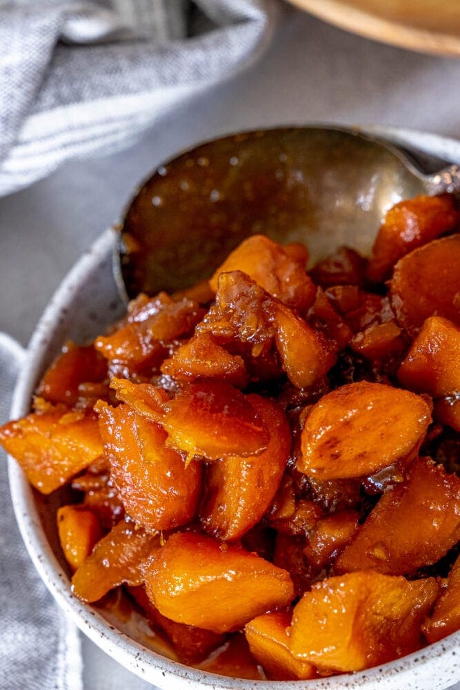 picture of candied yams in a white bowl 