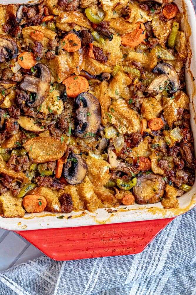 picture of sausage and mushroom stuffing in a baking dish 
