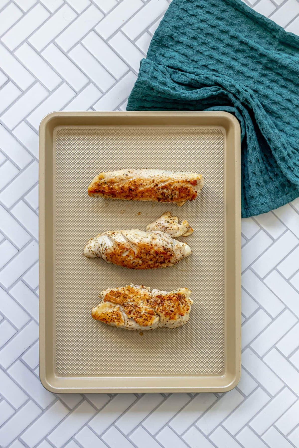 picture of turkey tenderloins on a baking sheet