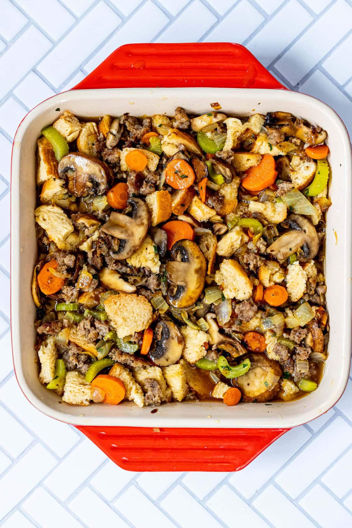 picture of stuffing ready to be baked in a baking dish
