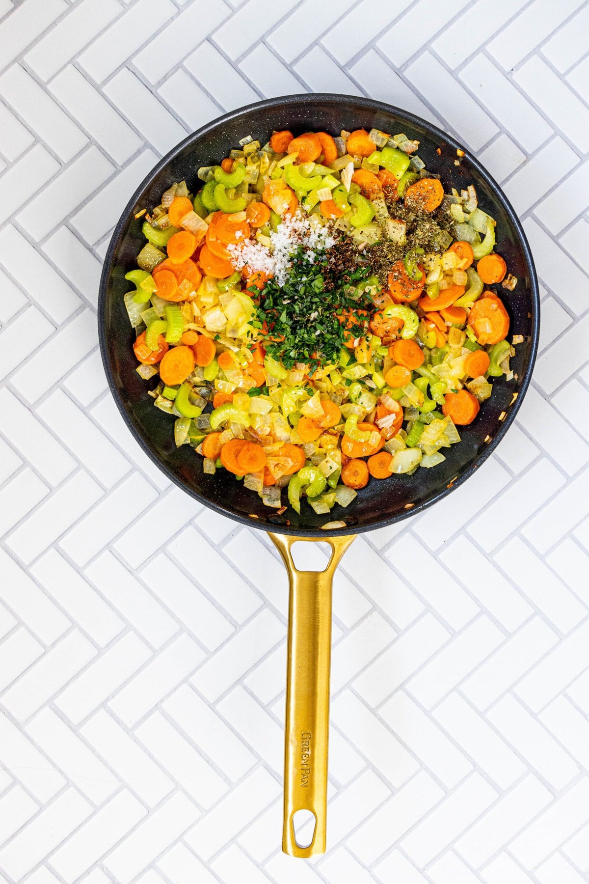 A frying pan with sausage and mushroom stuffing.