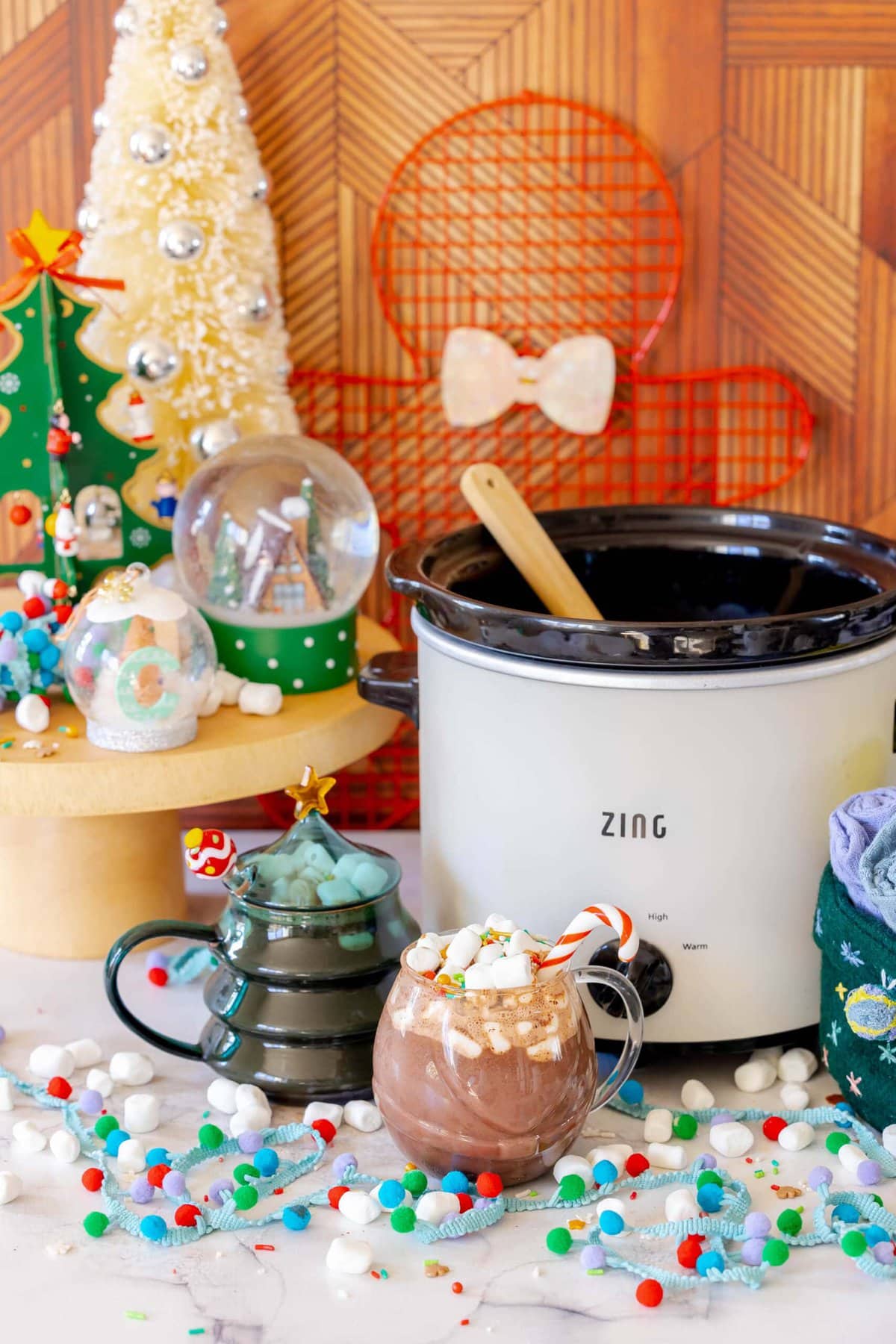 Rich and Creamy Slow Cooker Hot Chocolate 2 A mug of rich, homemade slow cooker hot chocolate, garnished with fluffy mini marshmallows.