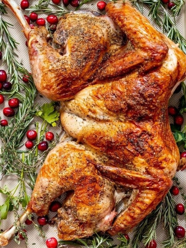 picture of spatchcock turkey on a baking sheet