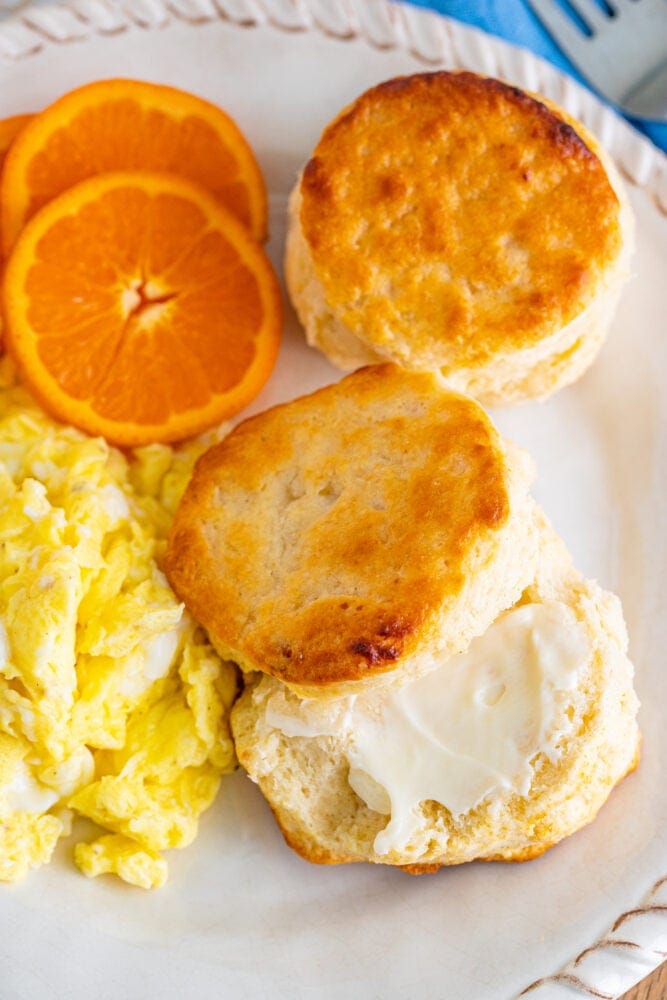 picture of buttermilk biscuits stacked on a plate