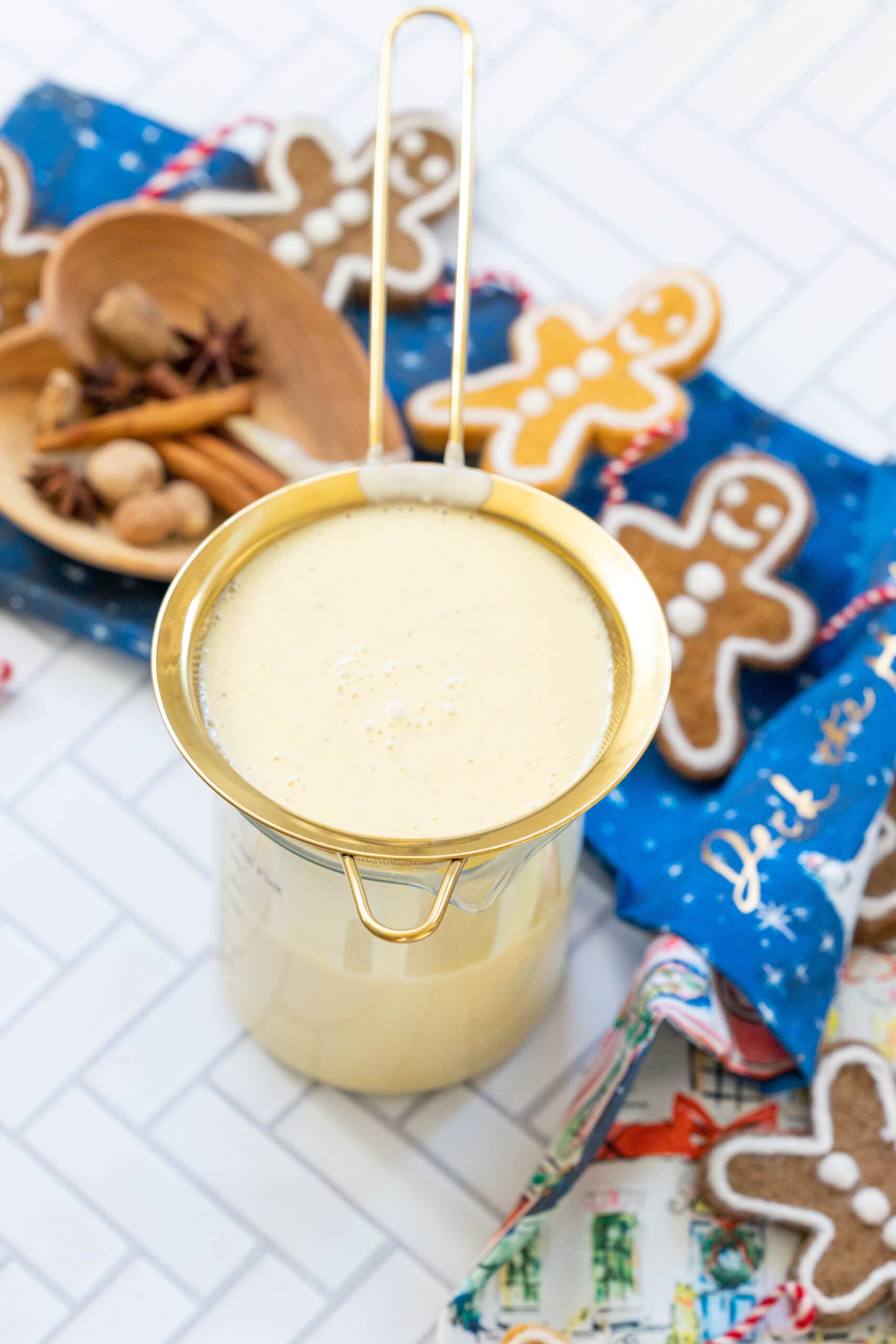 eggnog draining in a strainer