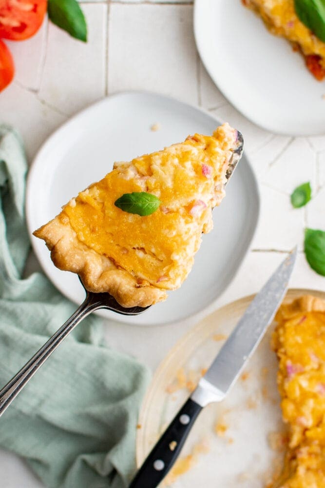 picture of baked tomato pie on a pie fork 