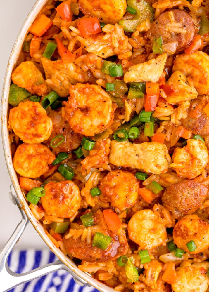 picture of jambalaya with shrimp, sausage, and chicken in a pan on a table