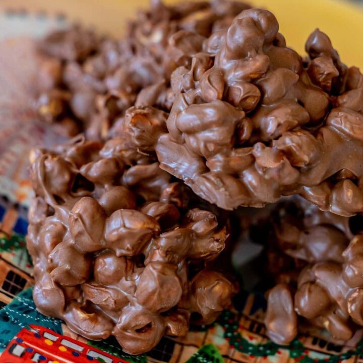 a pile of peanut clusters on a plate