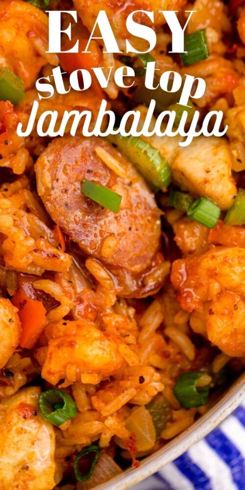 picture of jambalaya with shrimp, sausage, and chicken in a pan on a table