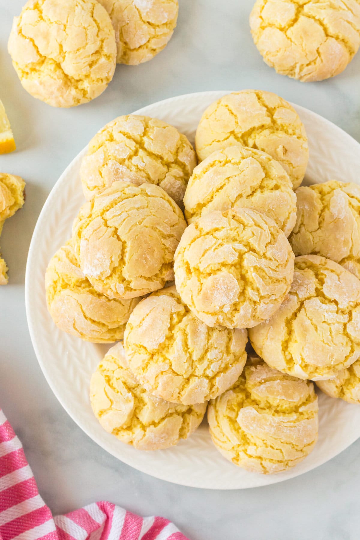 pile of yellow cookies on a plate