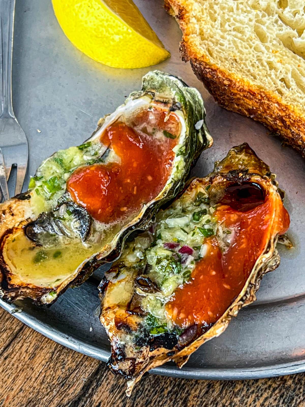 picture of bbq oysters on a metal plate