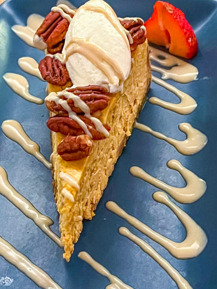 picture of a slice of cheesecake on a blue plate