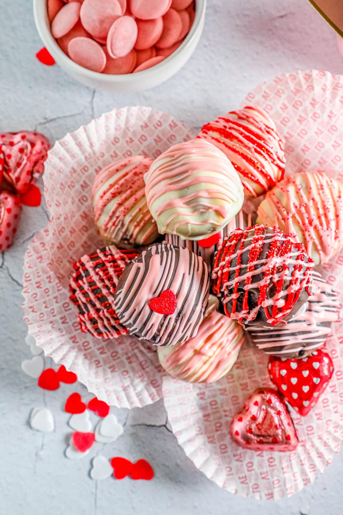 Valentine's day red velvet truffles in a white bowl.