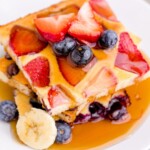 picture of sheetpan pancakes on a plate with syrup