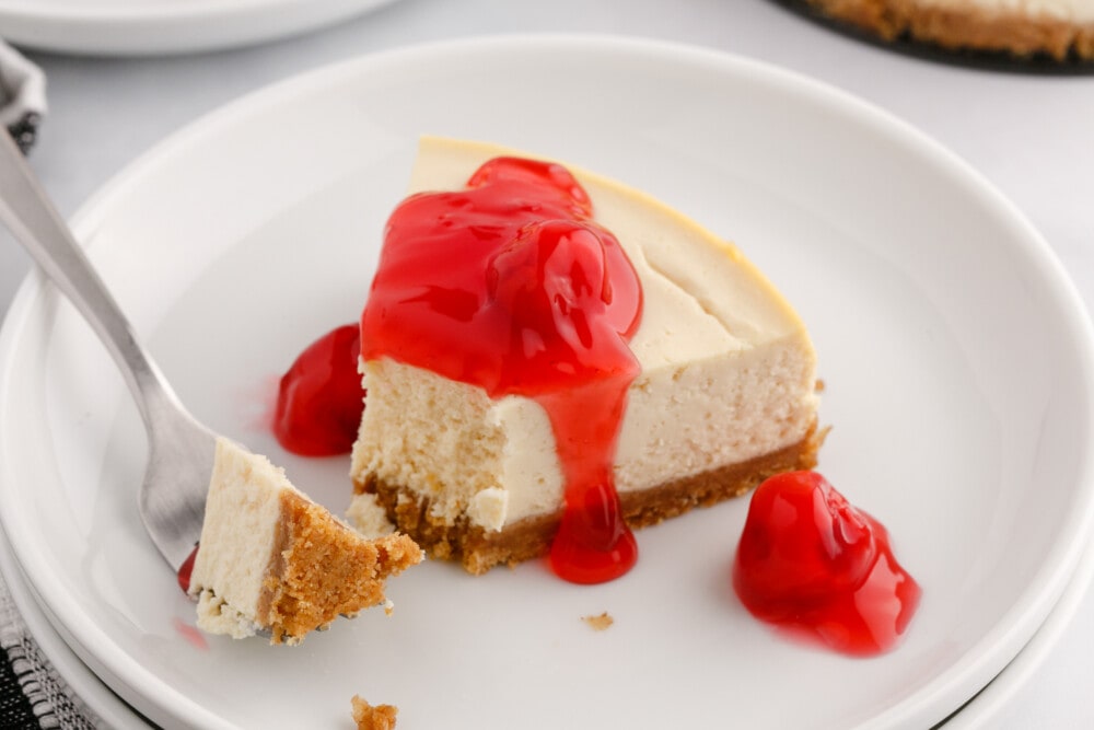 picture of cherry cheesecake in front of an instant pot
