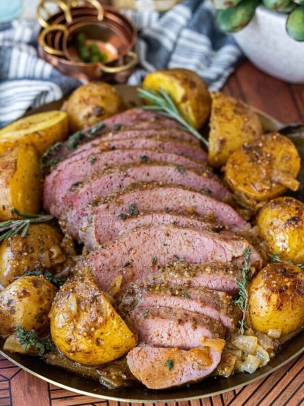 corned beef surrounded by potatoes