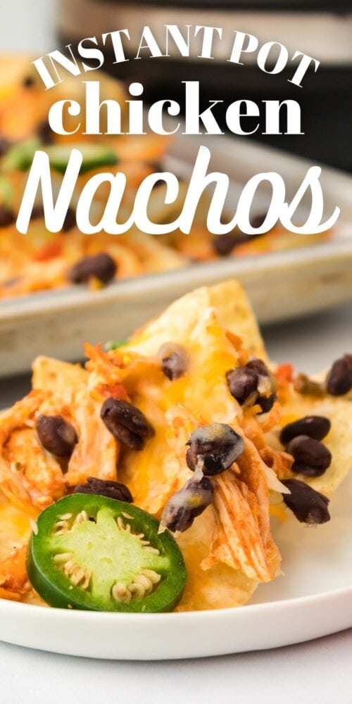 picture of chicken nachos on a baking sheet