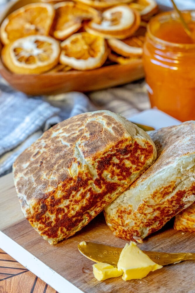 picture of irish potato bread on a cutting board with butter