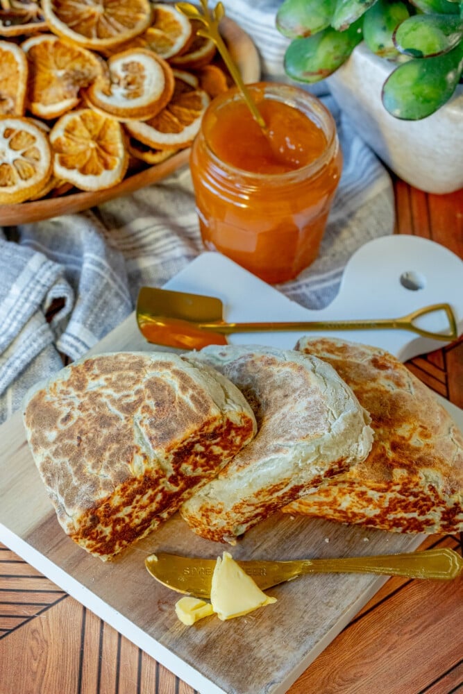 picture of irish potato bread on a cutting board with butter