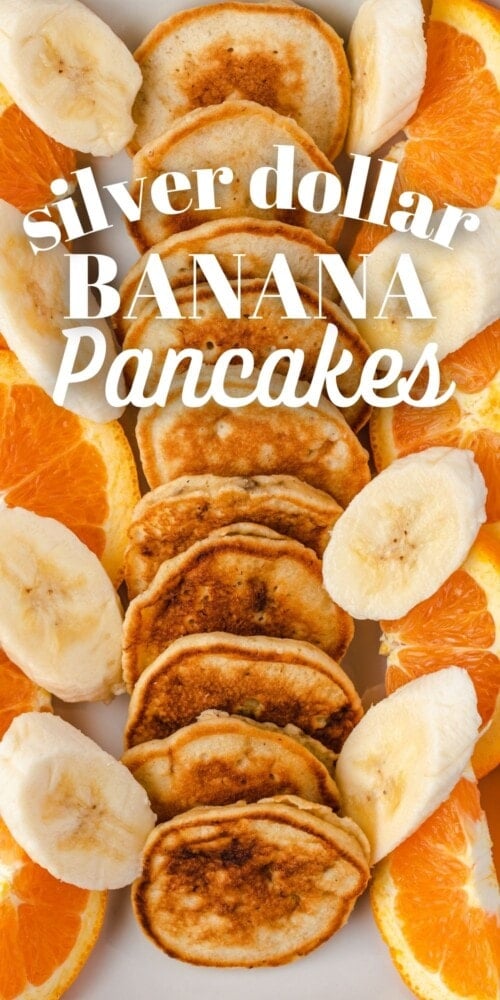 picture of silver dollar pancakes on a platter with orange slices and banana