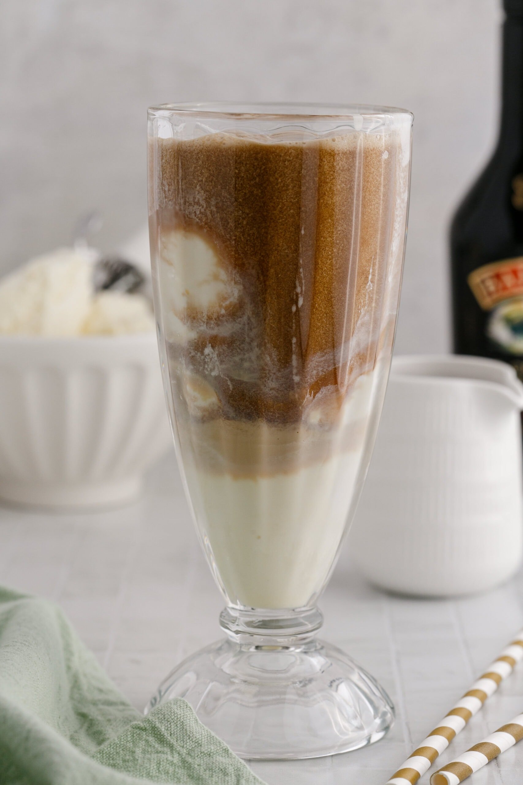 a glass full of guinness and baileys