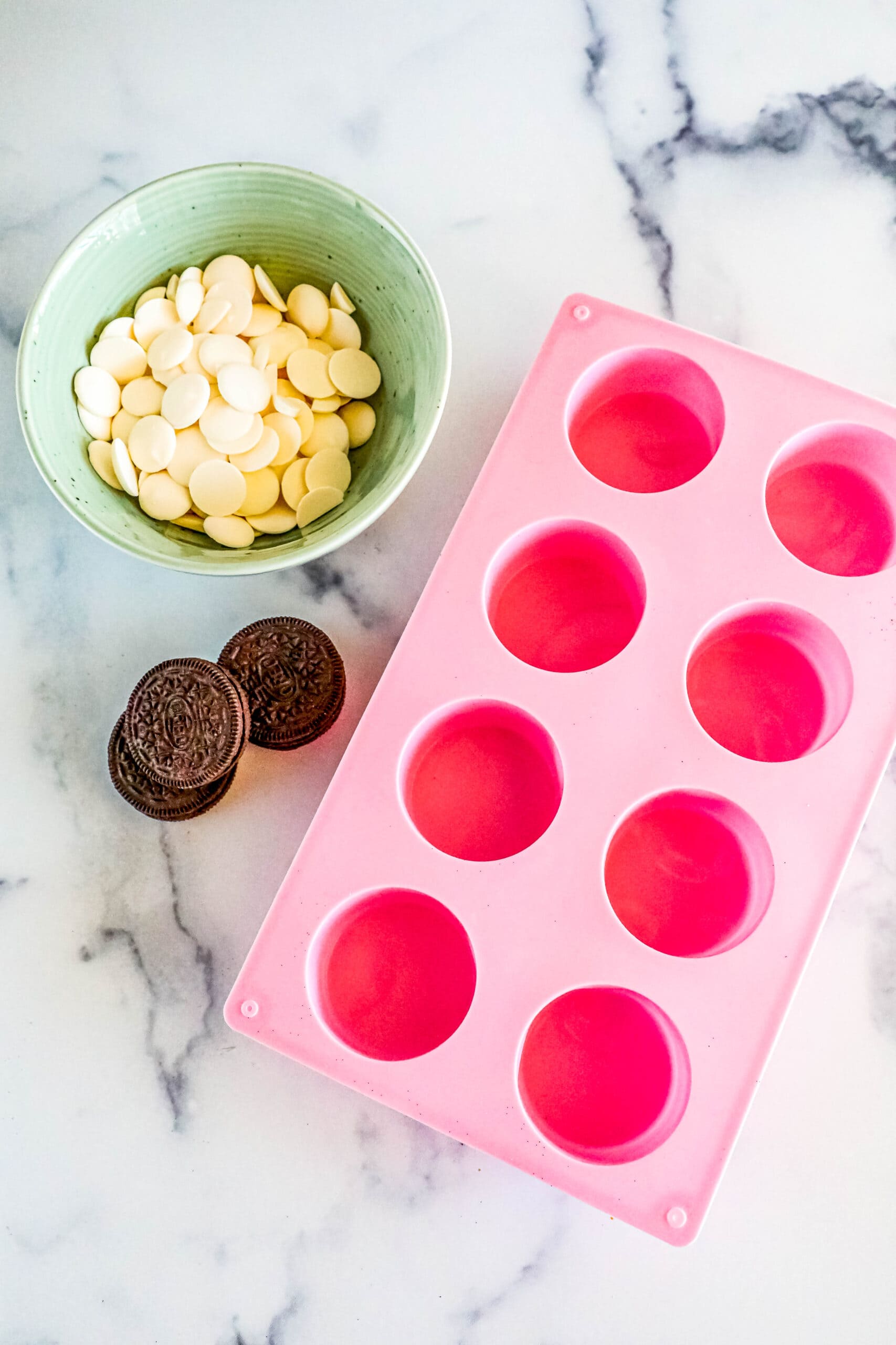 picture of chocolate, oreos, and a dipping mold