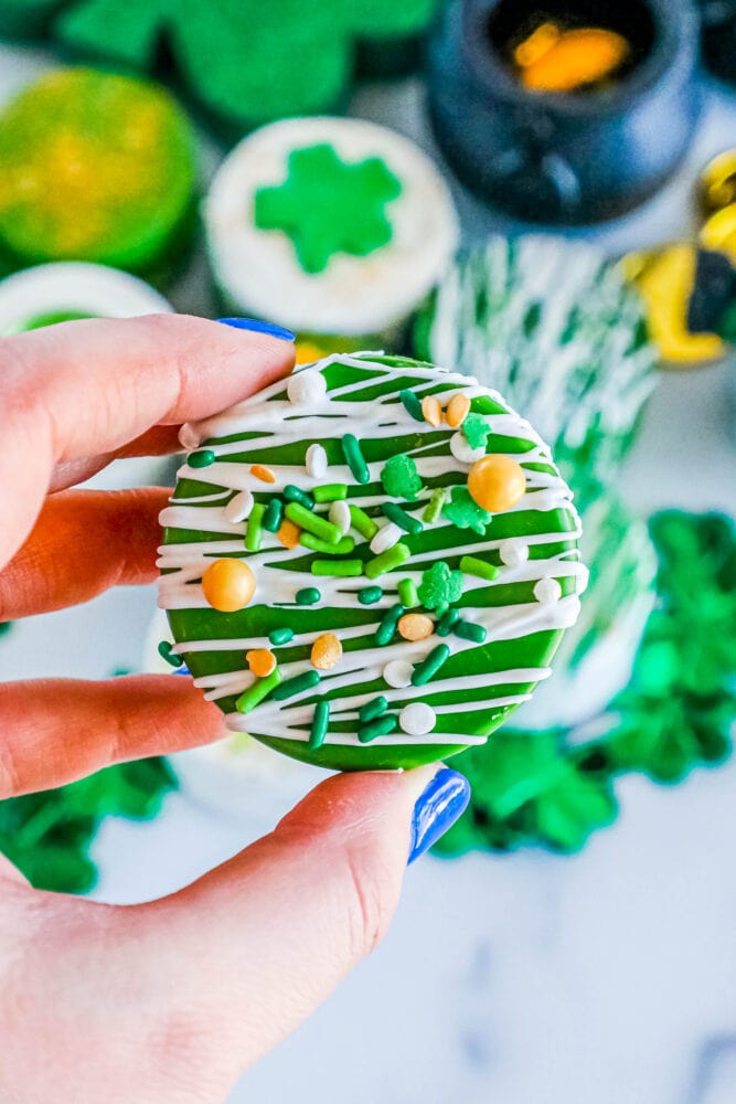 picture of oreos dipped in chocolate and decorated for saint patricks day