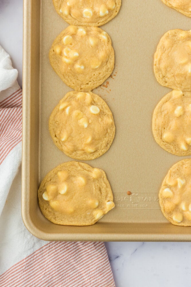 picture of cheesecake pudding cookies on a baking sheet