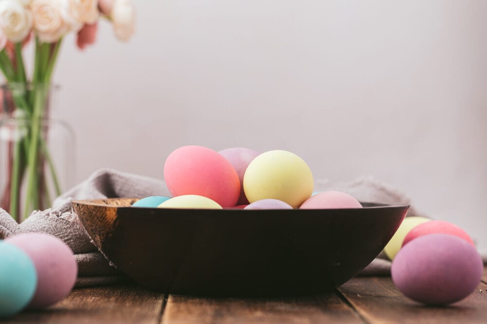pastel dyed easter eggs in a bowl 