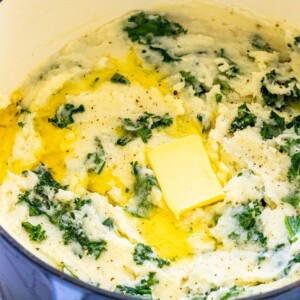picture of mashed potato and kale irish colcannon in a blue dutch oven