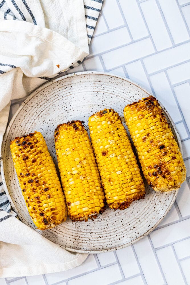 picture of grilled corn on a plate
