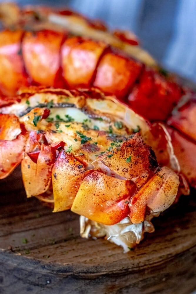 picture of grilled lobster tail on a cutting board