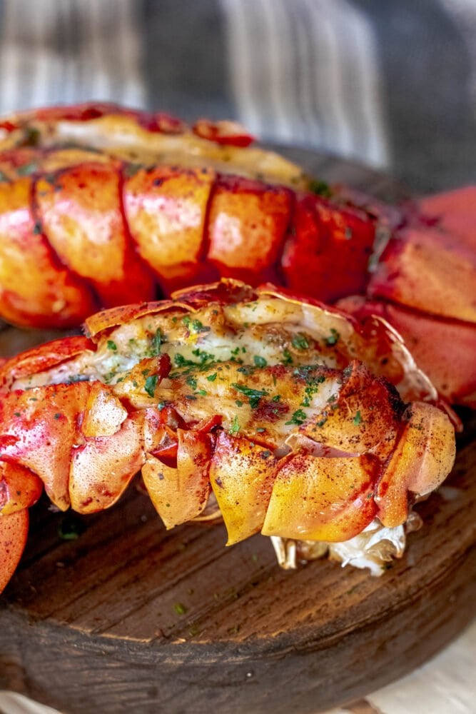 picture of grilled lobster tail on a cutting board